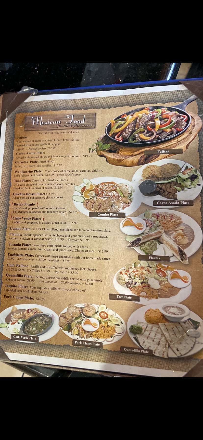 Printed menu showing seafood and Mexican dishes.